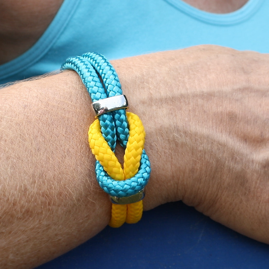 Damen-Segeltau-armband-pure-blau-gelb-silber-geflochten-Edelstahlverschluss-getragen-wavepirate-shop-st